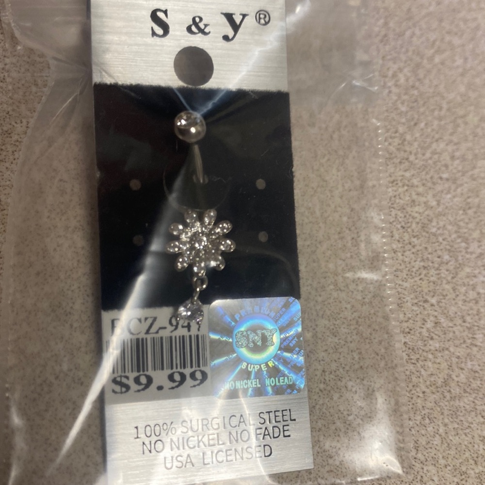 “Surgical steel” navel ring